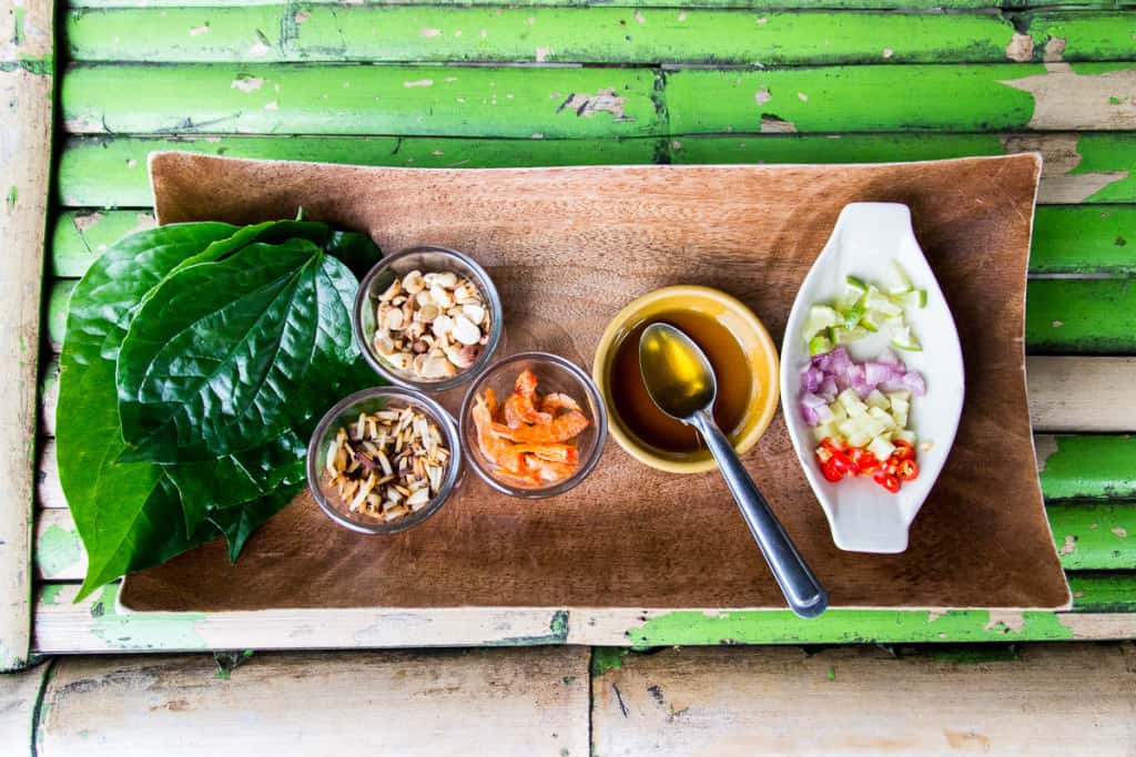 Ingredients for miang kham on a platter.