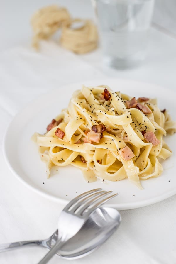 The Creamiest No Cream Carbonara Pasta - Your dinner dreams have come true. A gourmet meal ready in minutes with only a few ingredients. You've got this. | wandercooks.com