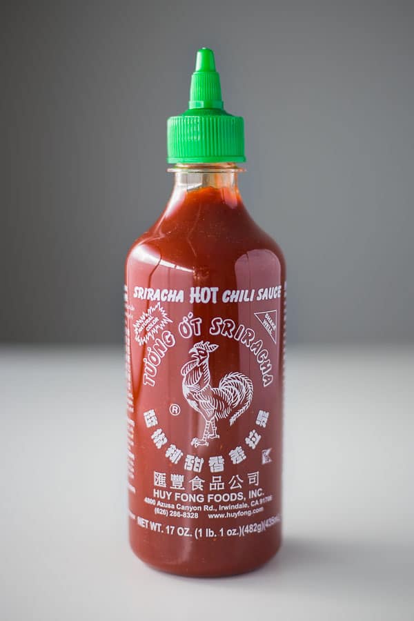 Bottle of Sriracha hot chilli sauce.