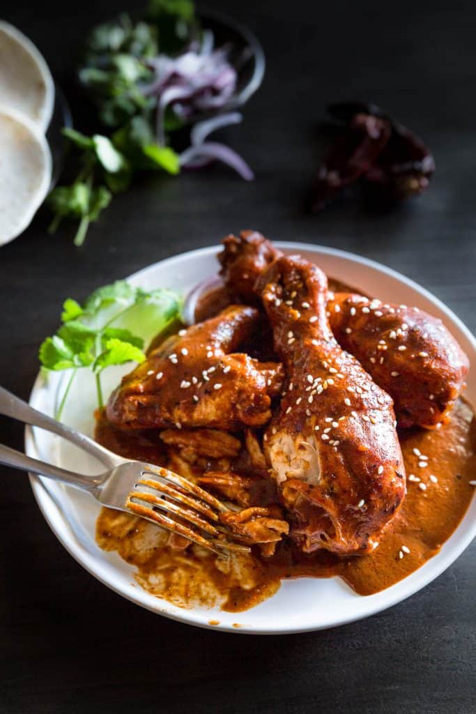 Pieces of succulent chicken in a chocolate mole sauce.