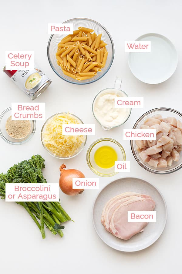 Ingredients laid out ready to make creamy chicken pasta bake.