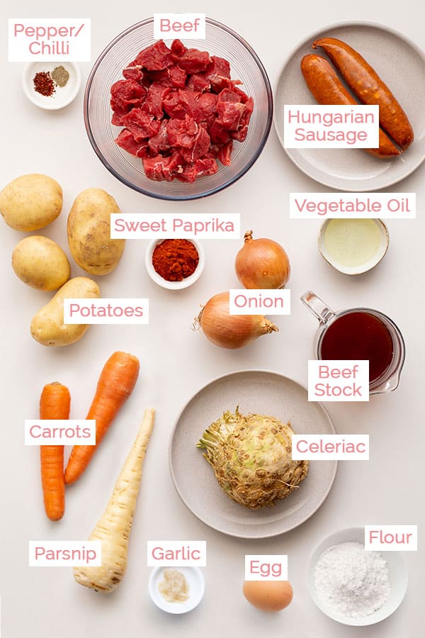 Ingredients laid out for traditional Hungarian gulyas.