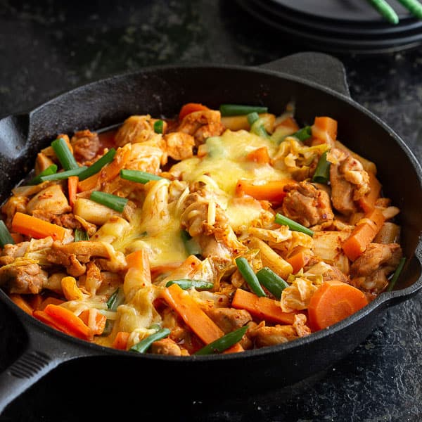 Spicy Korean Chicken stir fry in a pan.