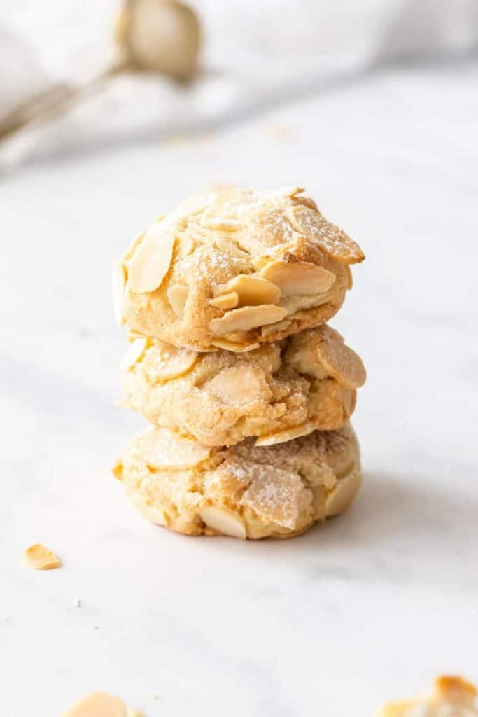 Stack of three almond cookies.