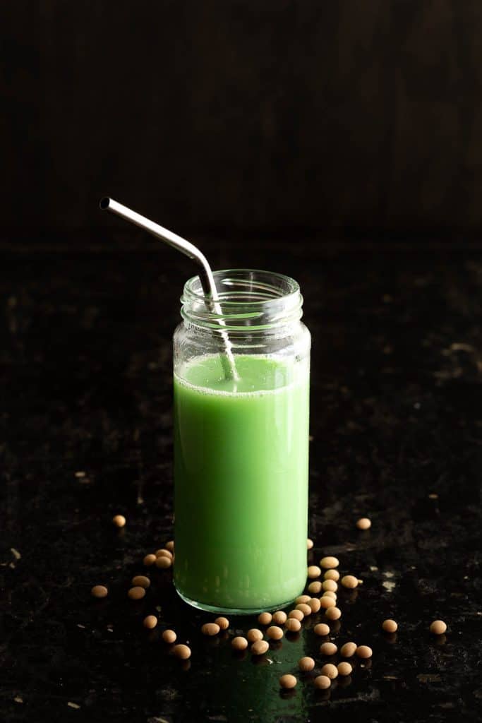 Green coloured pandan soy milk with soy beans.