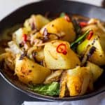 Close up shot of sri lankan deviled potatoes.