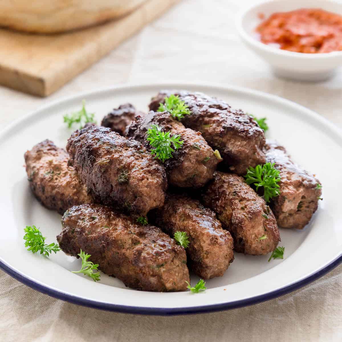 Plate of cevapi beef sausages.