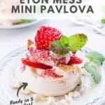 Close up shot of meringue dessert with fresh strawberries and homemade whipped cream.