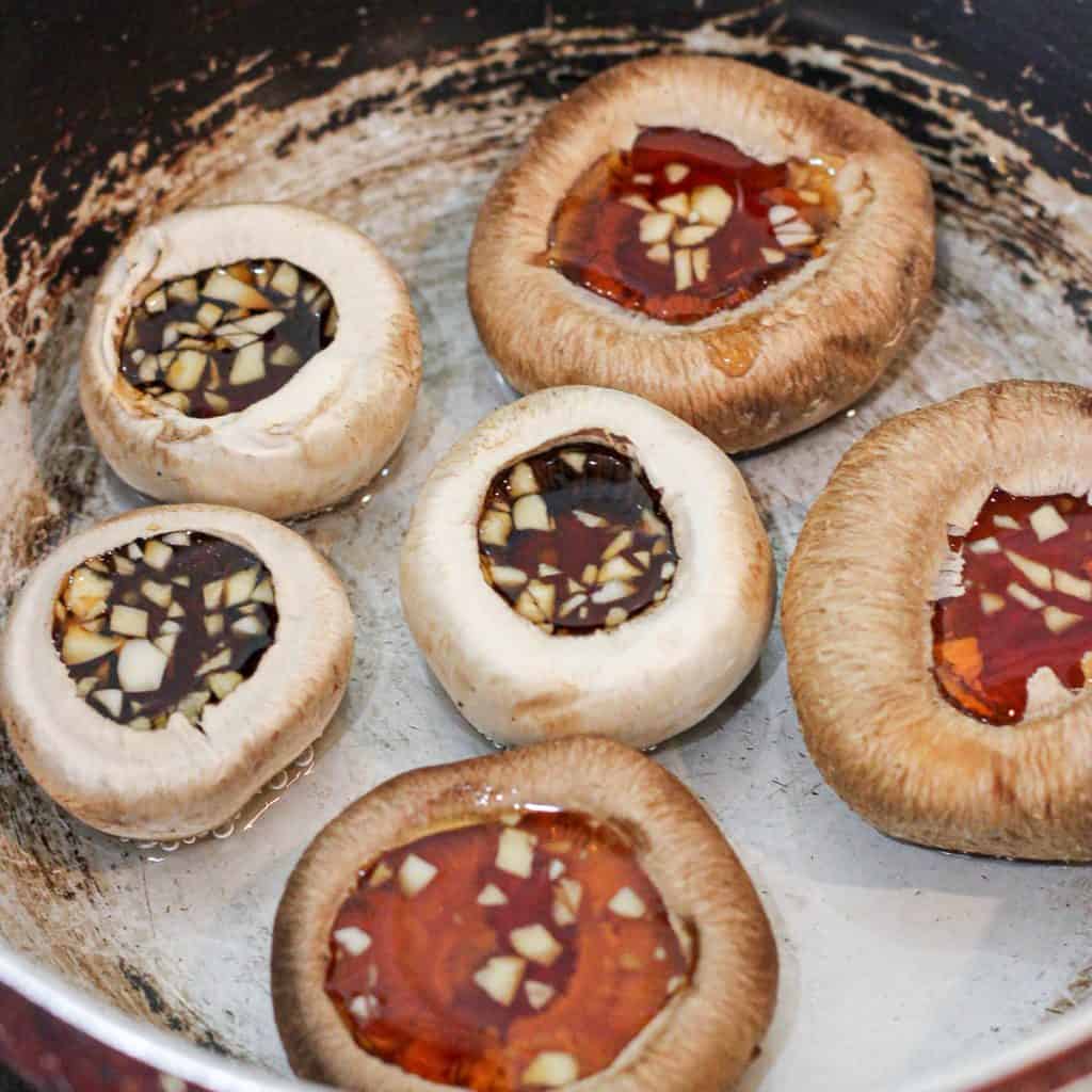 Slow cooking mushrooms in vegan marinade.