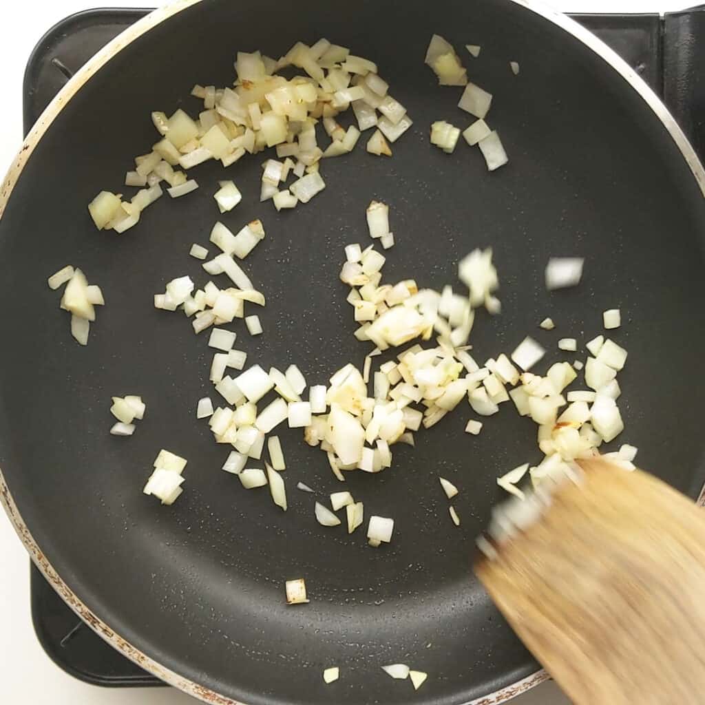 Frying onion in olive oil.