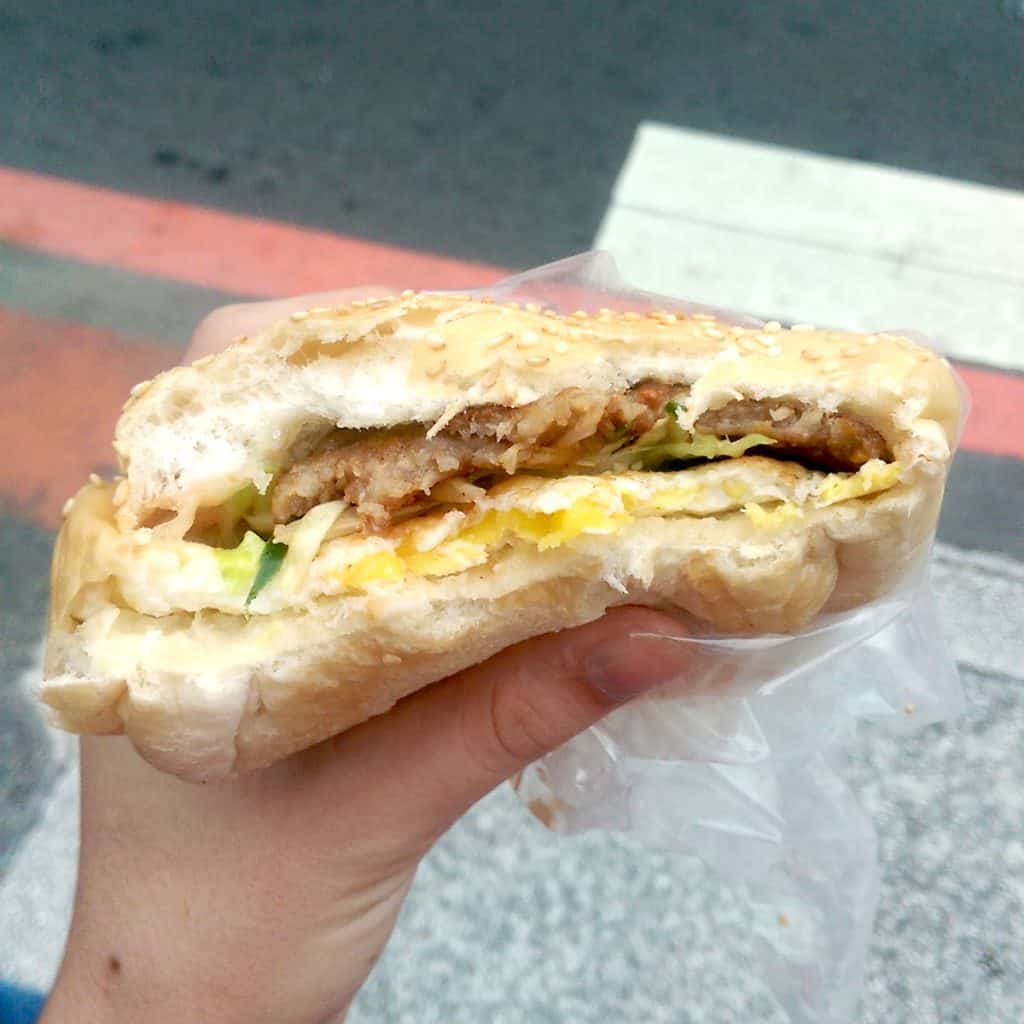 A half eaten pork burger in Taipei, Taiwan.