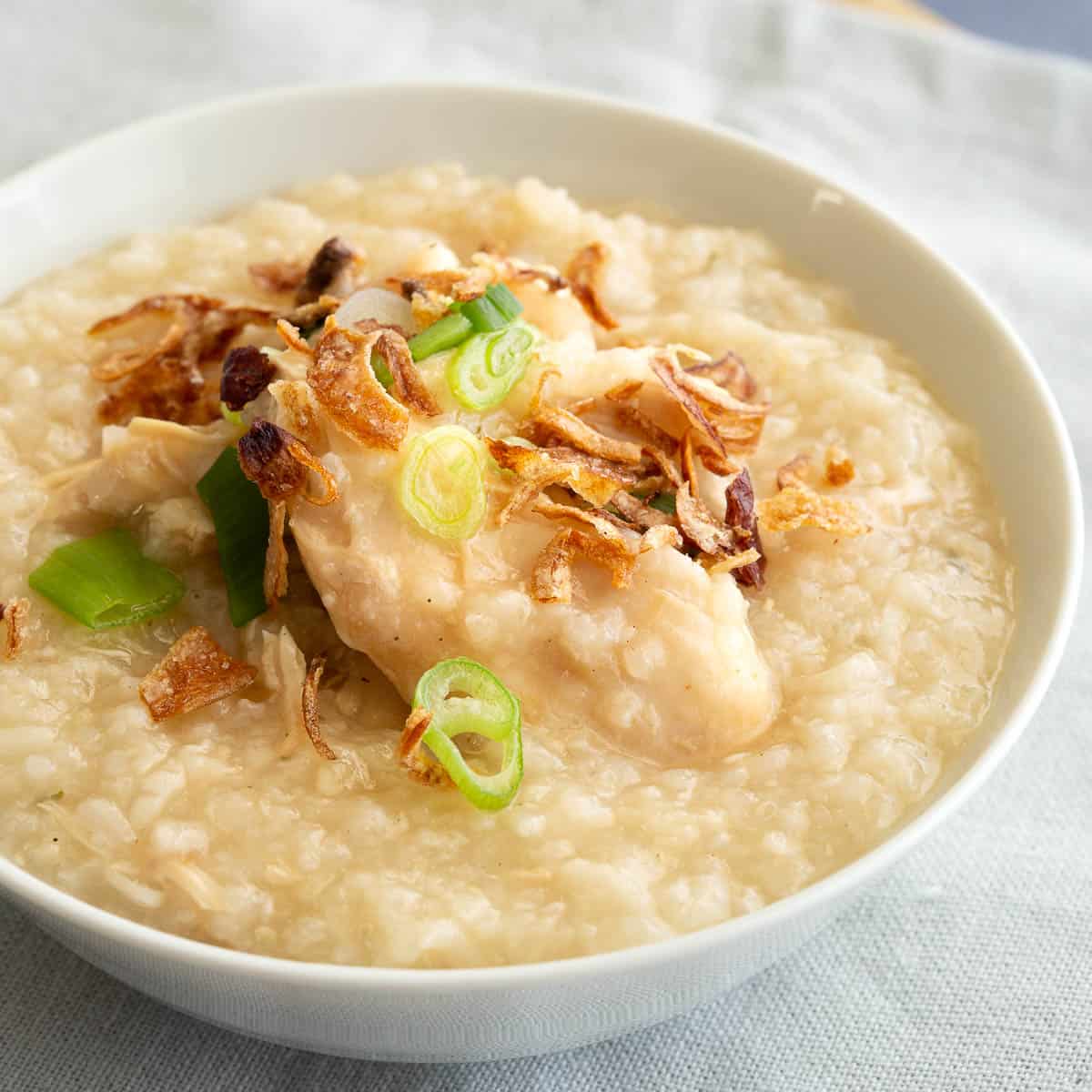 Close up of chao go - Vietnamese style chicken porridge.