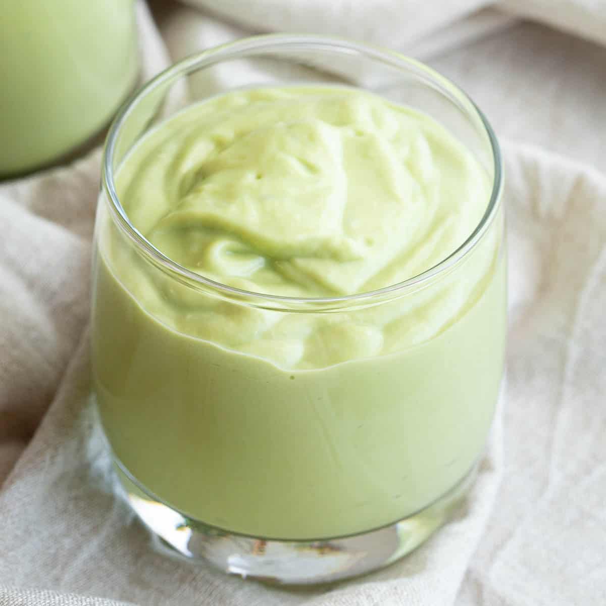 Close up shot of a glass of Vietnamese avocado smoothie.