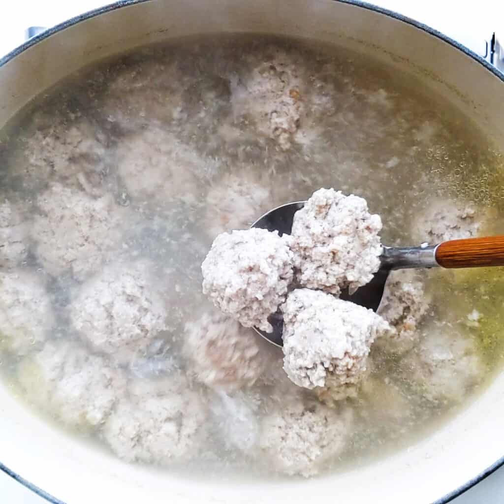 Taking the meatballs out of the water.
