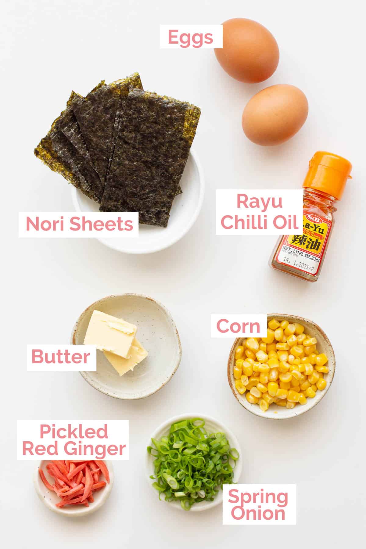 Topping options laid out for spicy miso ramen.