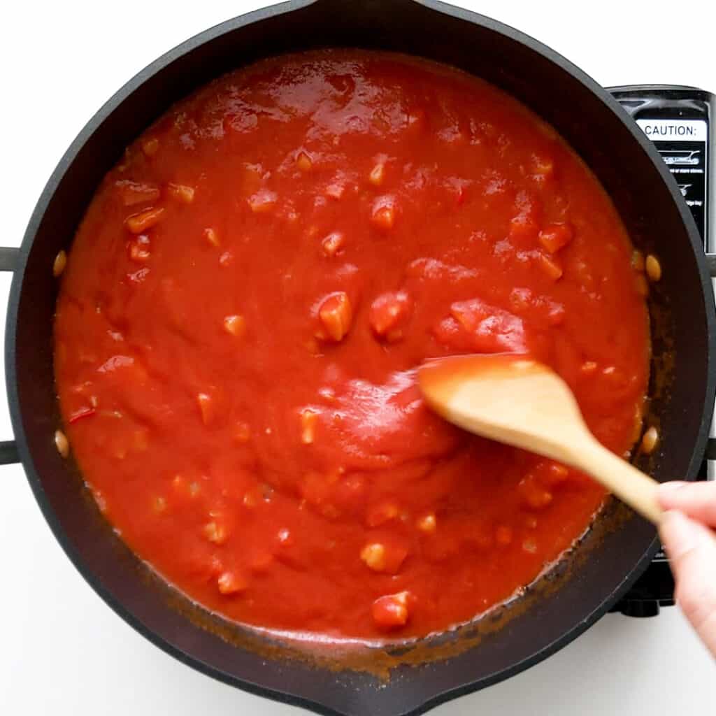 Simmering amatriciana pasta sauce.