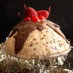 Festive Christmas ice-cream pudding set and ready to eat.