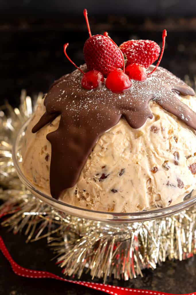 Frozen Christmas Ice Cream Pudding on cake stand.