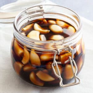 Jar of freshly made Korean pickled garlic, ready to store in the dark.