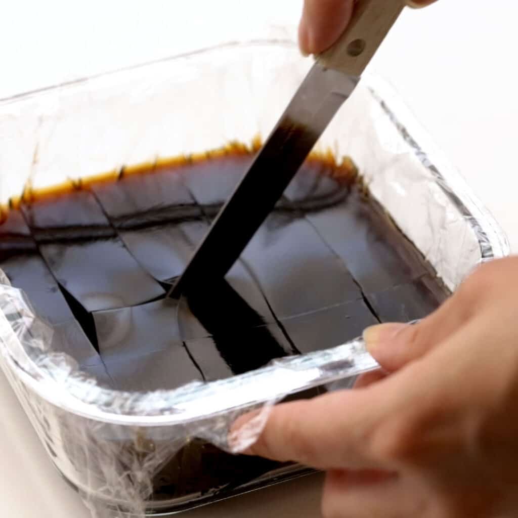 Cutting out coffee jelly cubes.