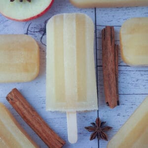 Top down shot of a popsicle next to spices.