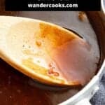 Worcestershire sauce on a wooden spoon.