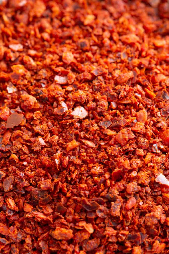 Close up shot of Korean chilli flakes showing the correct texture and colour.