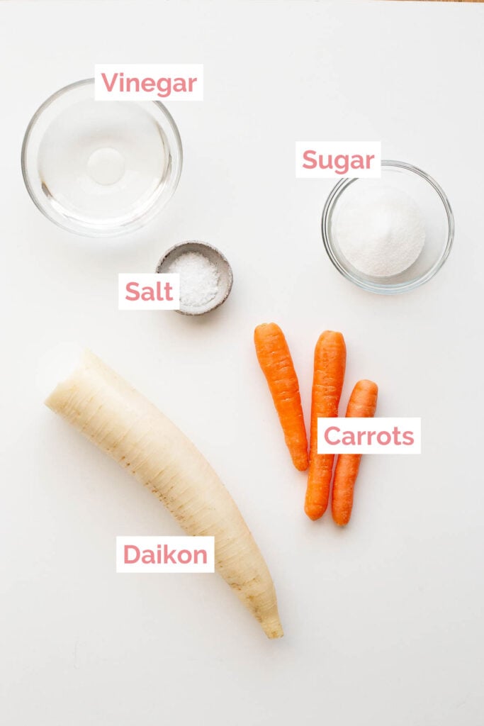 Ingredients laid out to make pickled carrots and daikon.