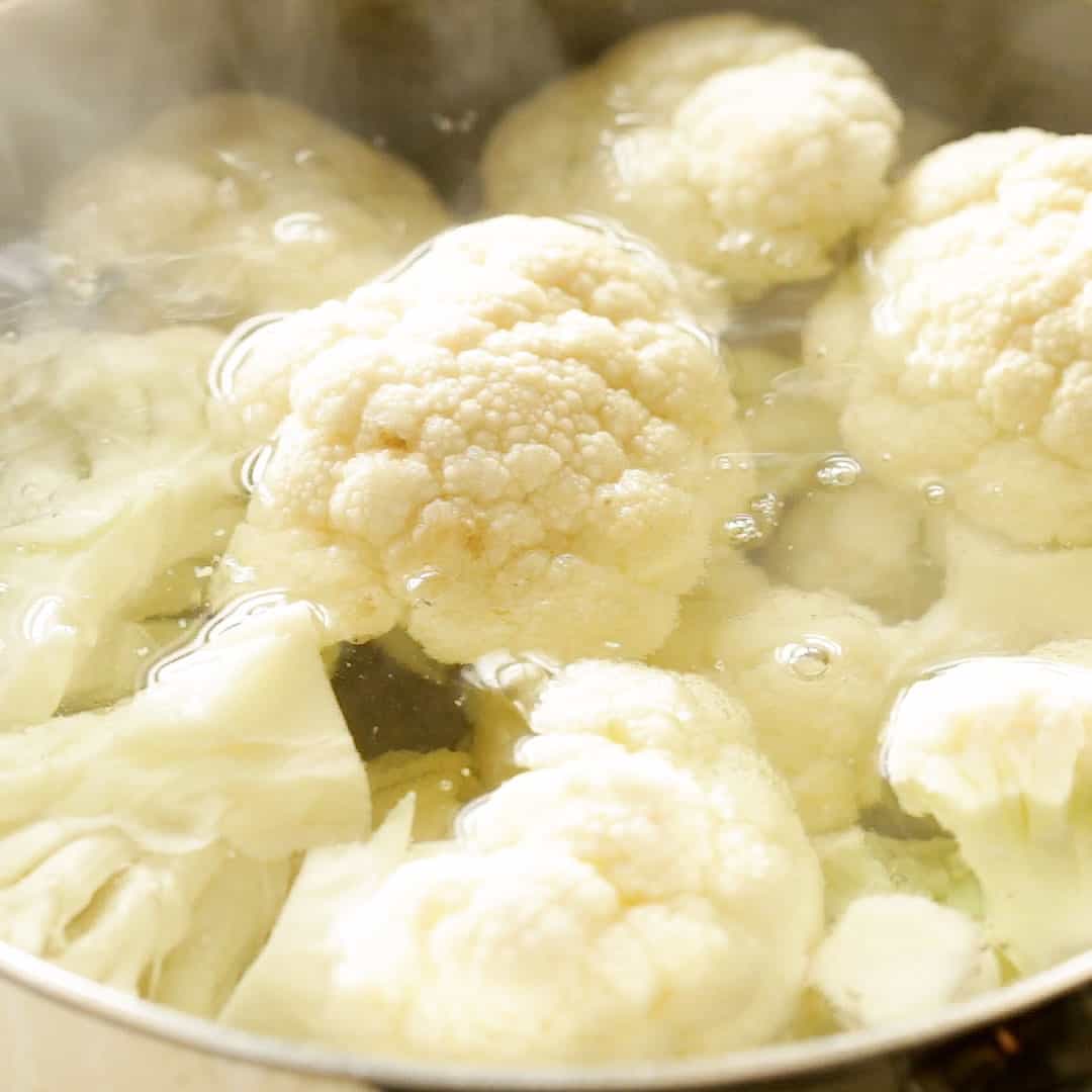 Cauliflower boiling in a saucepan.