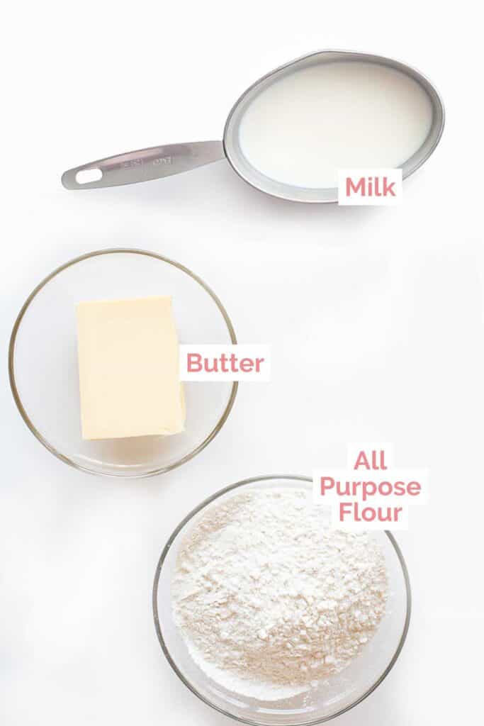 Ingredients laid out to make white sauce.
