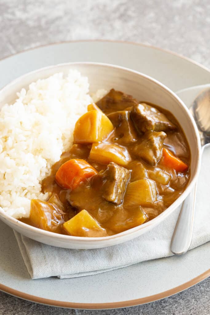 Japanese beef curry with chunks of potato, onion and carrot.