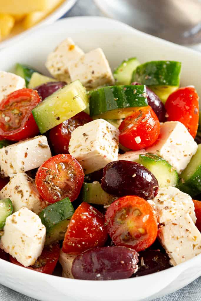 A colourful bowl of fresh Greek salad.
