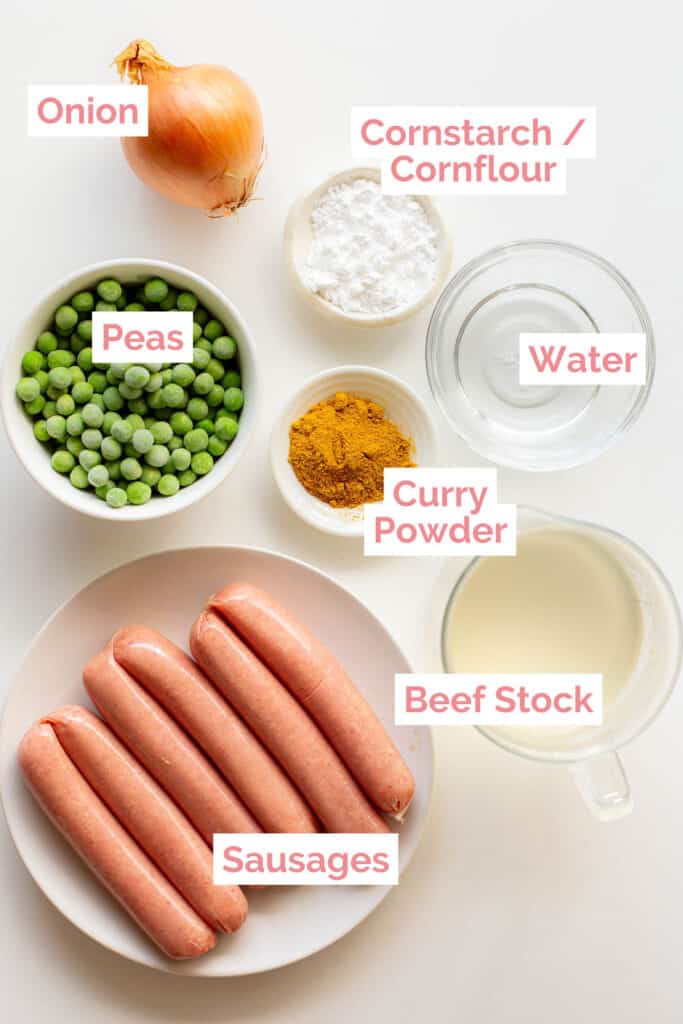 Ingredients laid out for curried sausages.
