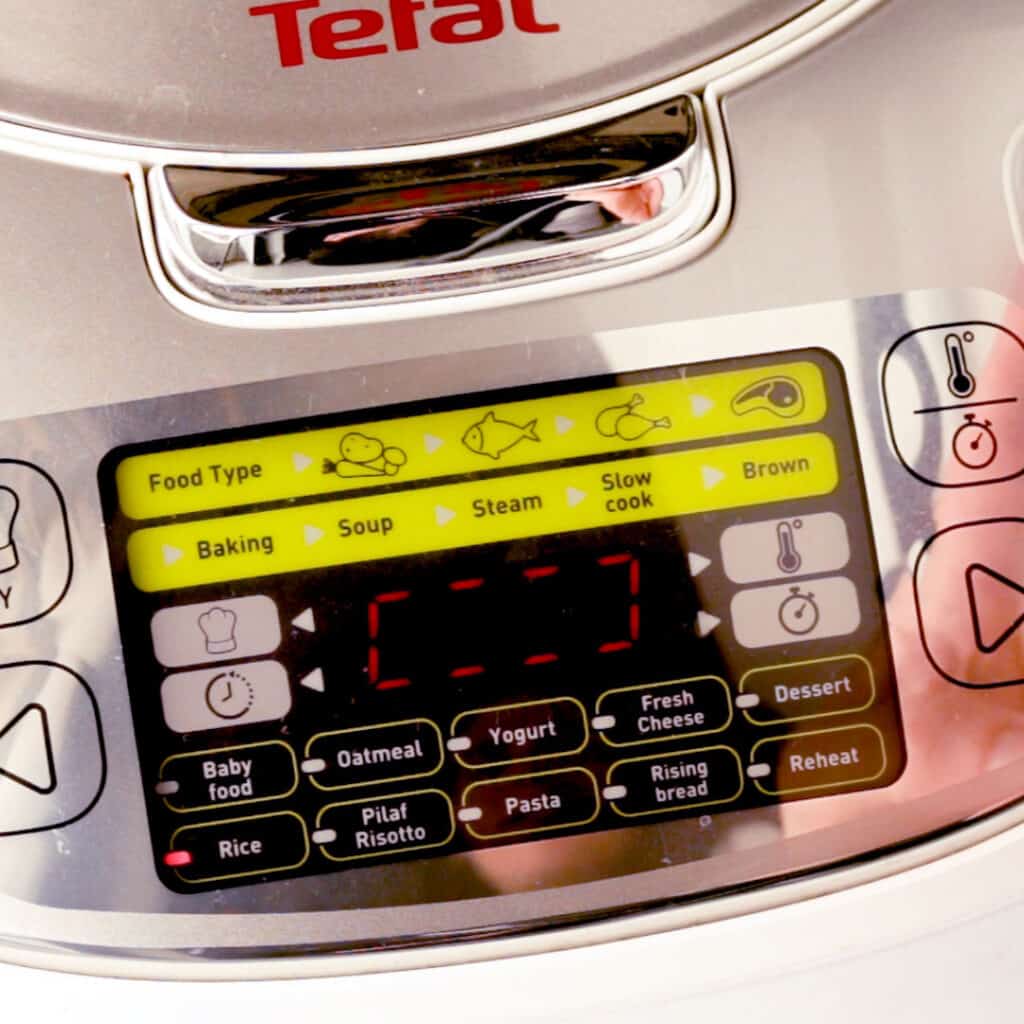 A rice cooker display, switched onto cook mode.