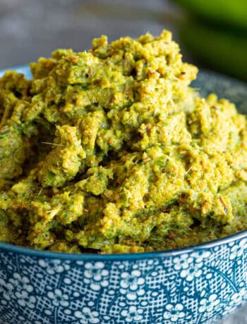 Bowl of bright Thai green curry paste, freshly made.