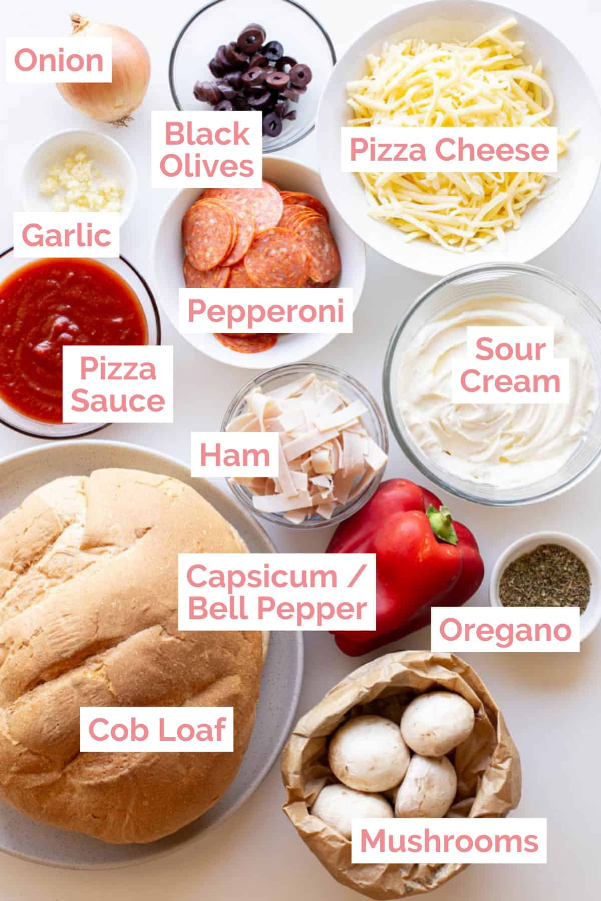 Ingredients laid out to make supreme pizza cob loaf.