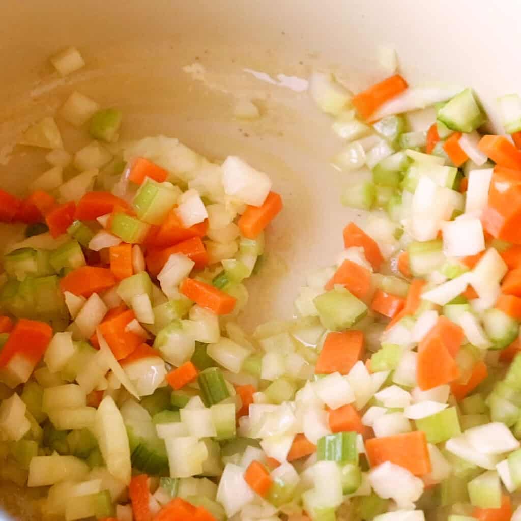 Cooking the celery, carrot and onion.