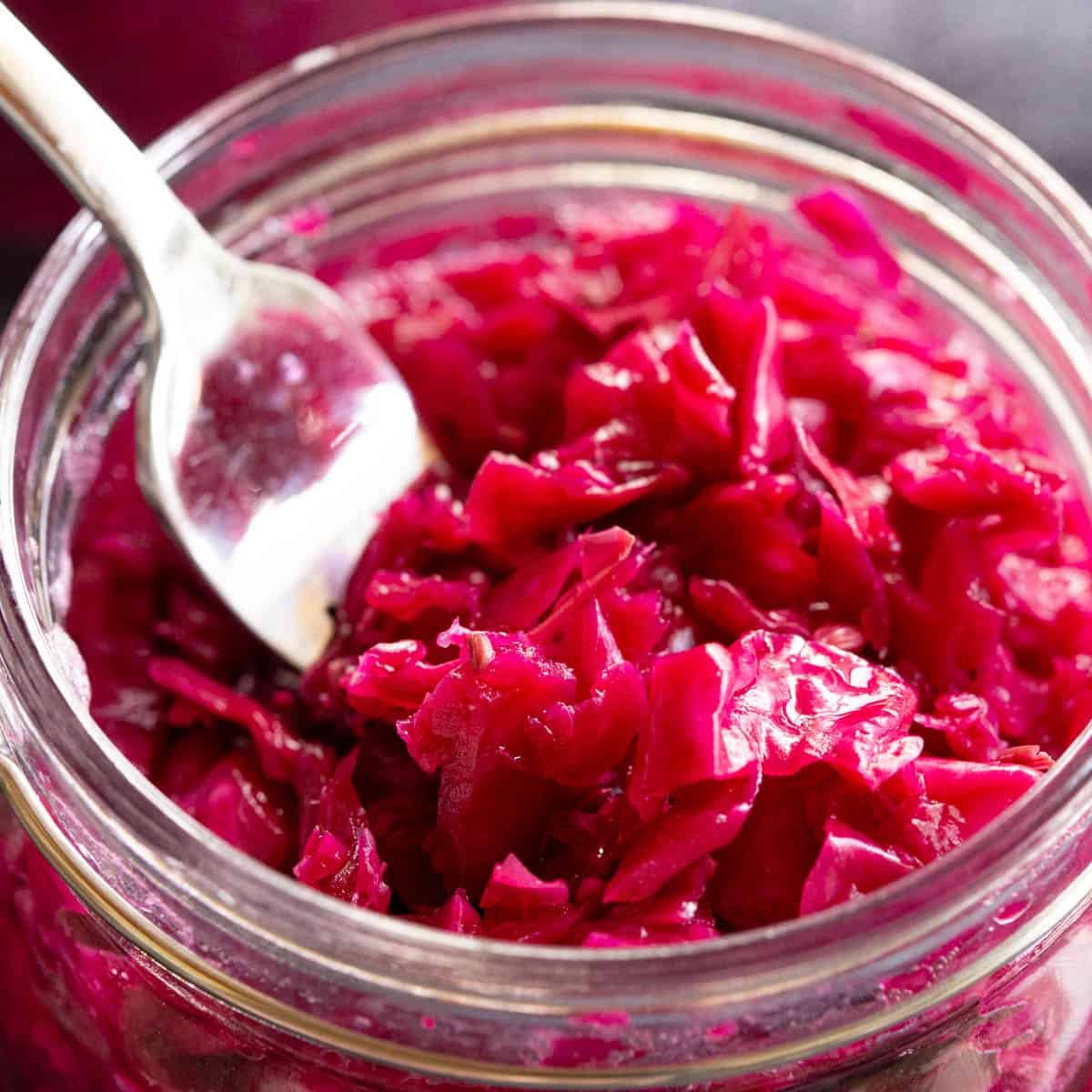 Bright red cabbage sauerkraut in a jar.