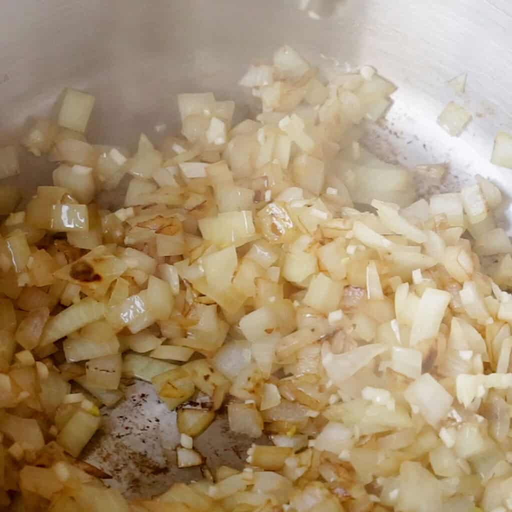 Frying onion in a saucepan.